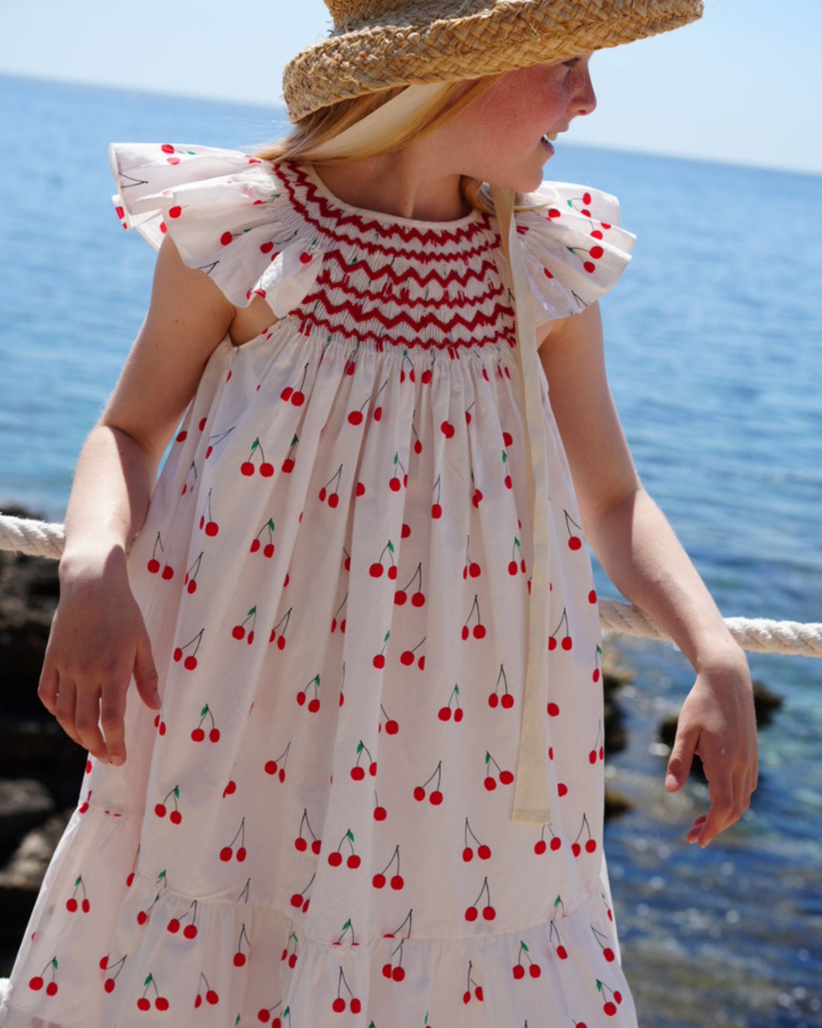 Indira Gandhi Flutter Dress Mon Cherry Cotton with a La Mode Hand Smocking