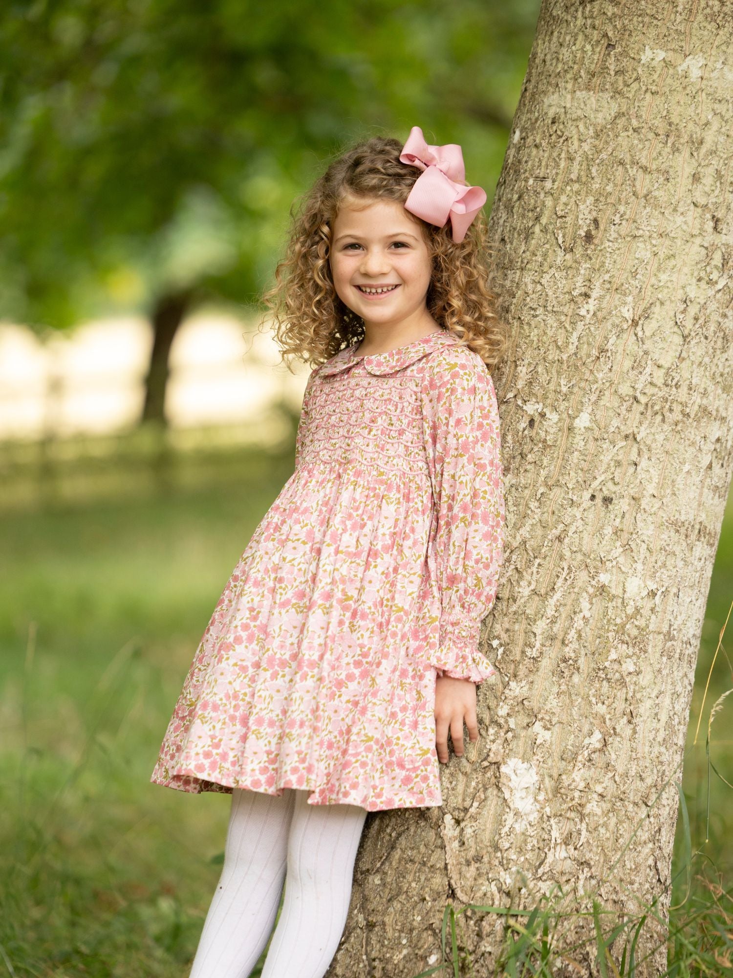 Antoinette Dress with Raspberry Crumble Hand Smocking made with Liberty Poppies & Daisies Fabric