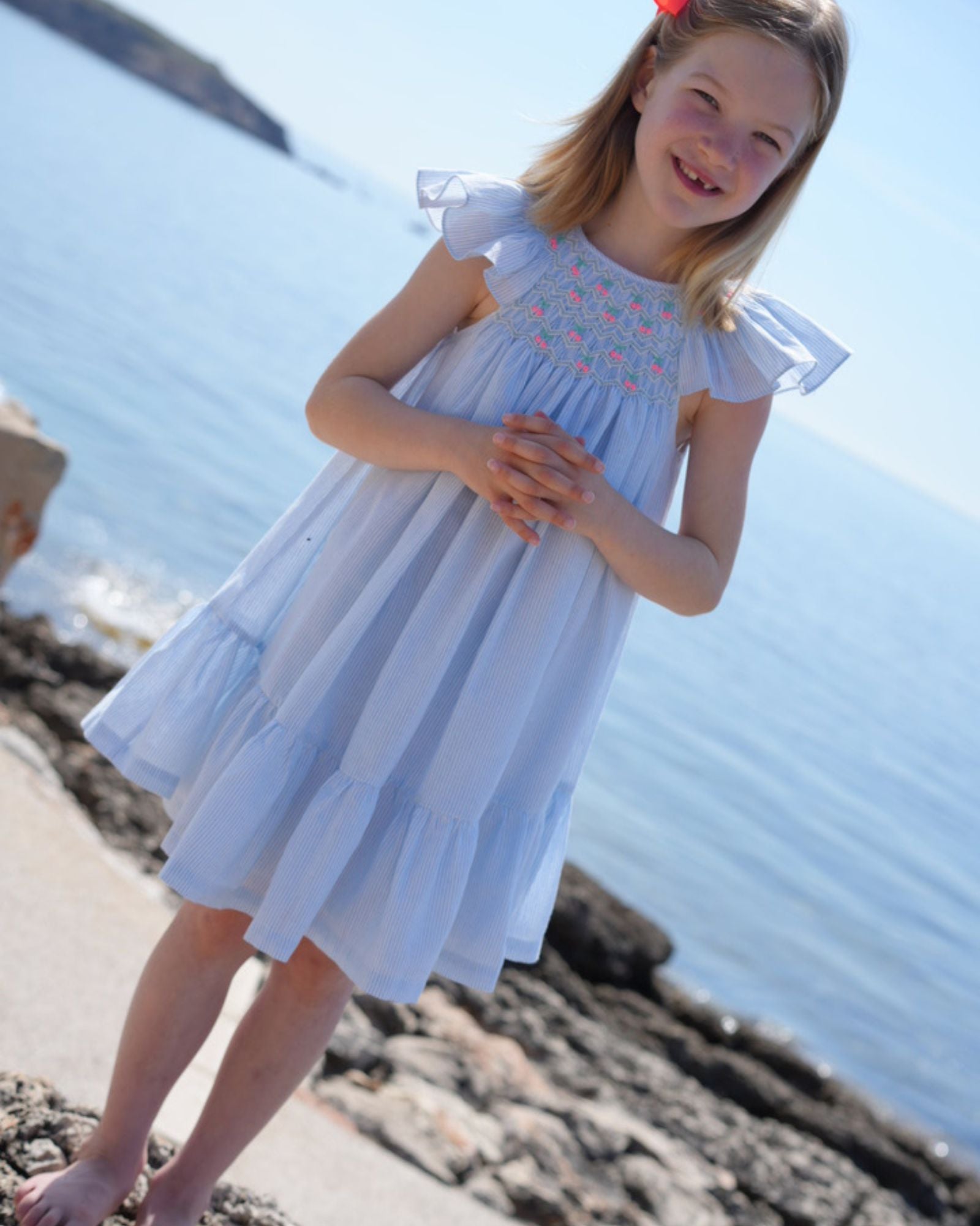 Indira Gandhi Flutter Dress Baby Blue Seersucker with Cherries Hand Smocking