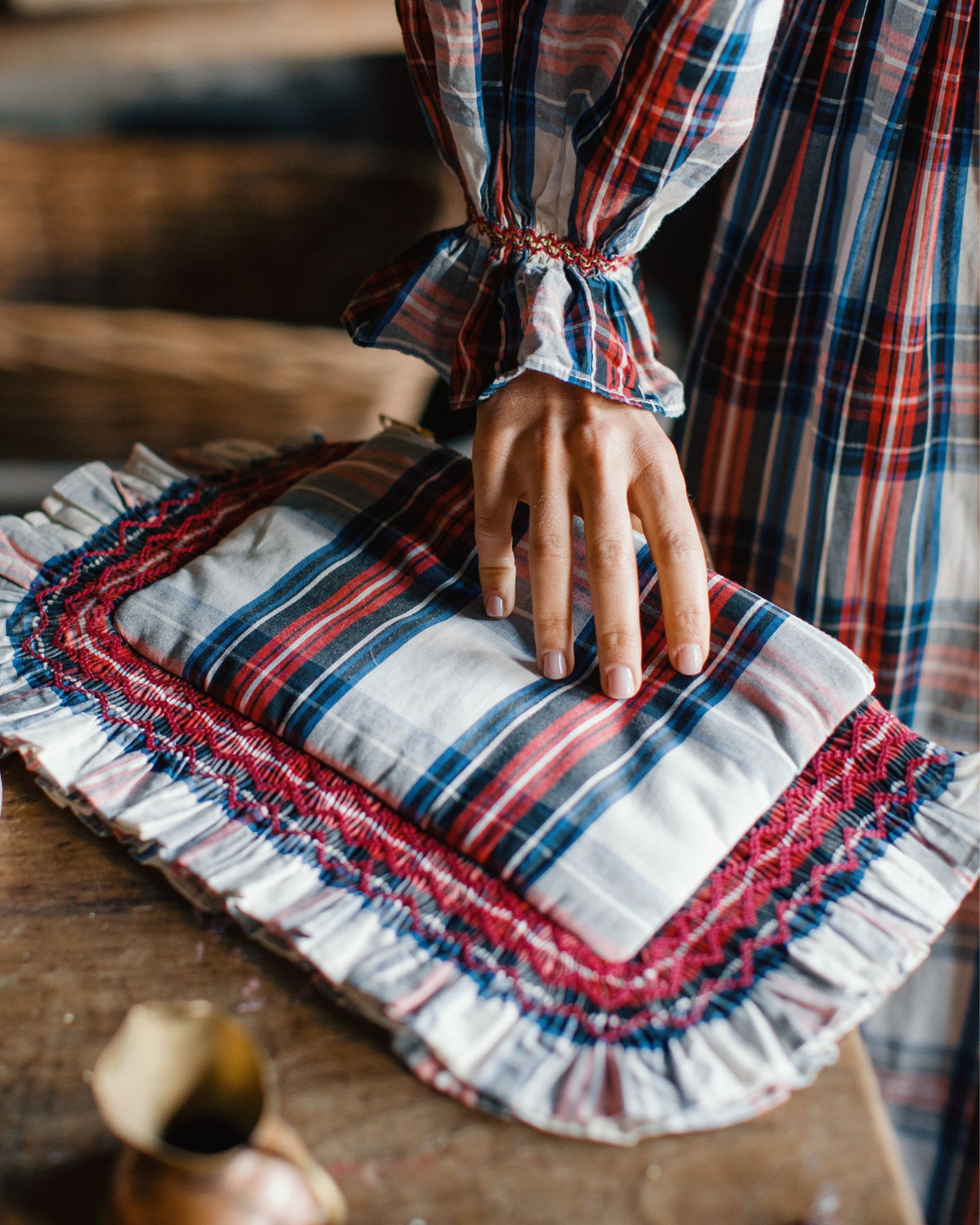 The Dolly Clutch Britannia Check with Winter Berry Hand Smocking