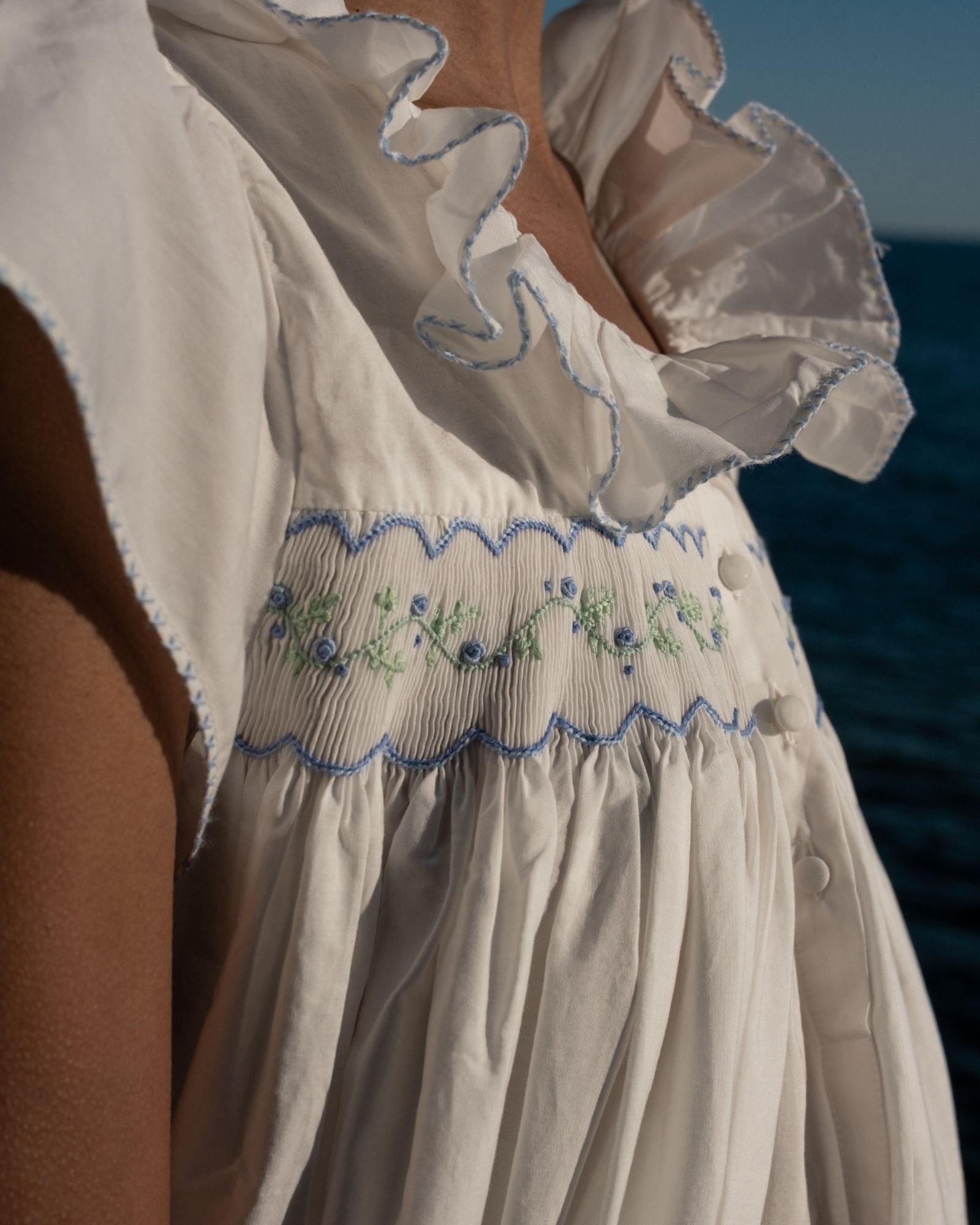 Nightingale Women's Short Sleeve Dress with Blue Blooms Hand Smocking