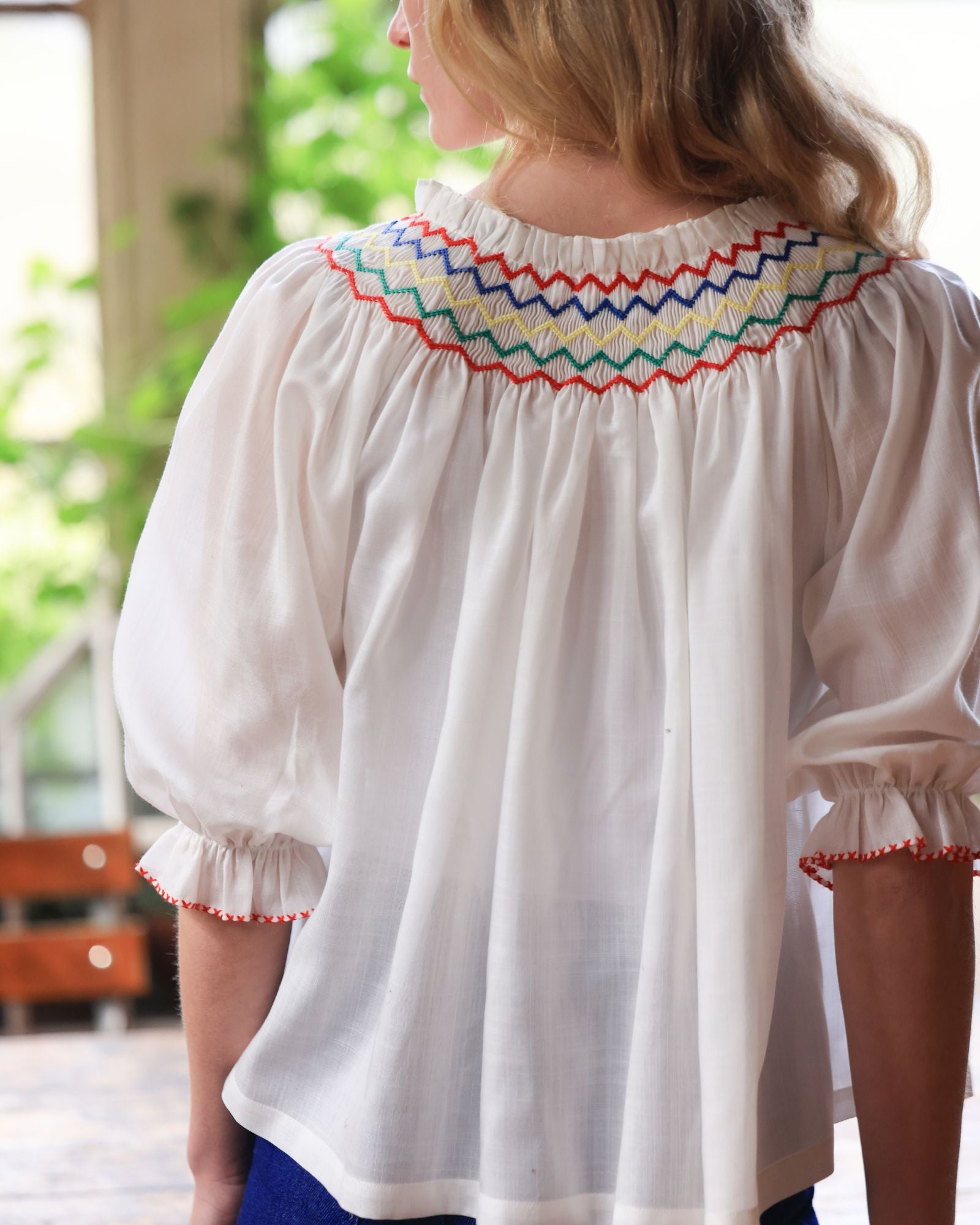 Cleopatra Blouse White Weave with Primary Colour Hand Smocking Edition 50