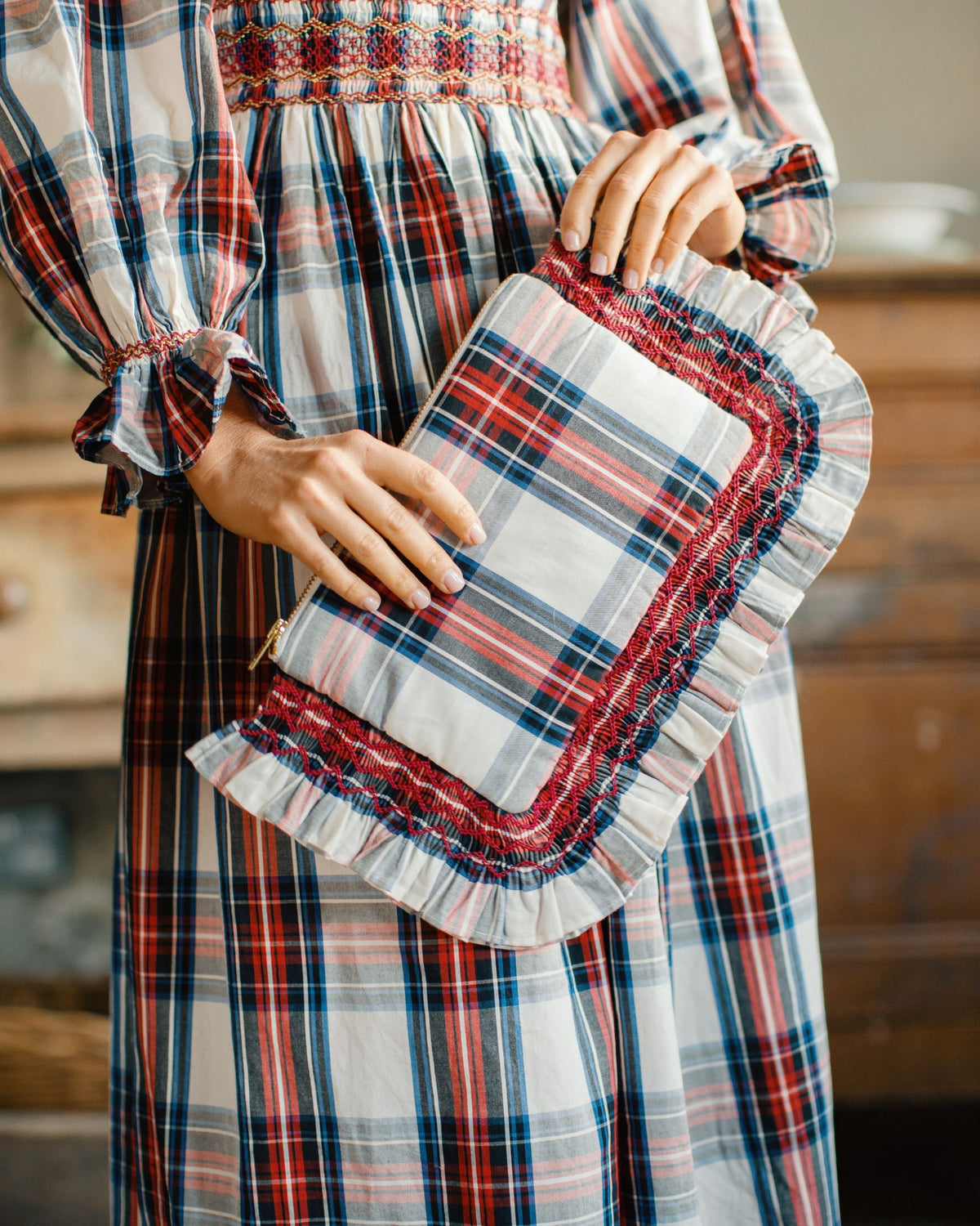 The Dolly Clutch Britannia Check with Winter Berry Hand Smocking