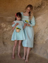 Josefine Butler Dress Kelly Green Seersucker with Cherry Pop Hand Smocking