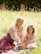 Antoinette Dress with Raspberry Crumble Hand Smocking made with Liberty Poppies & Daisies Fabric