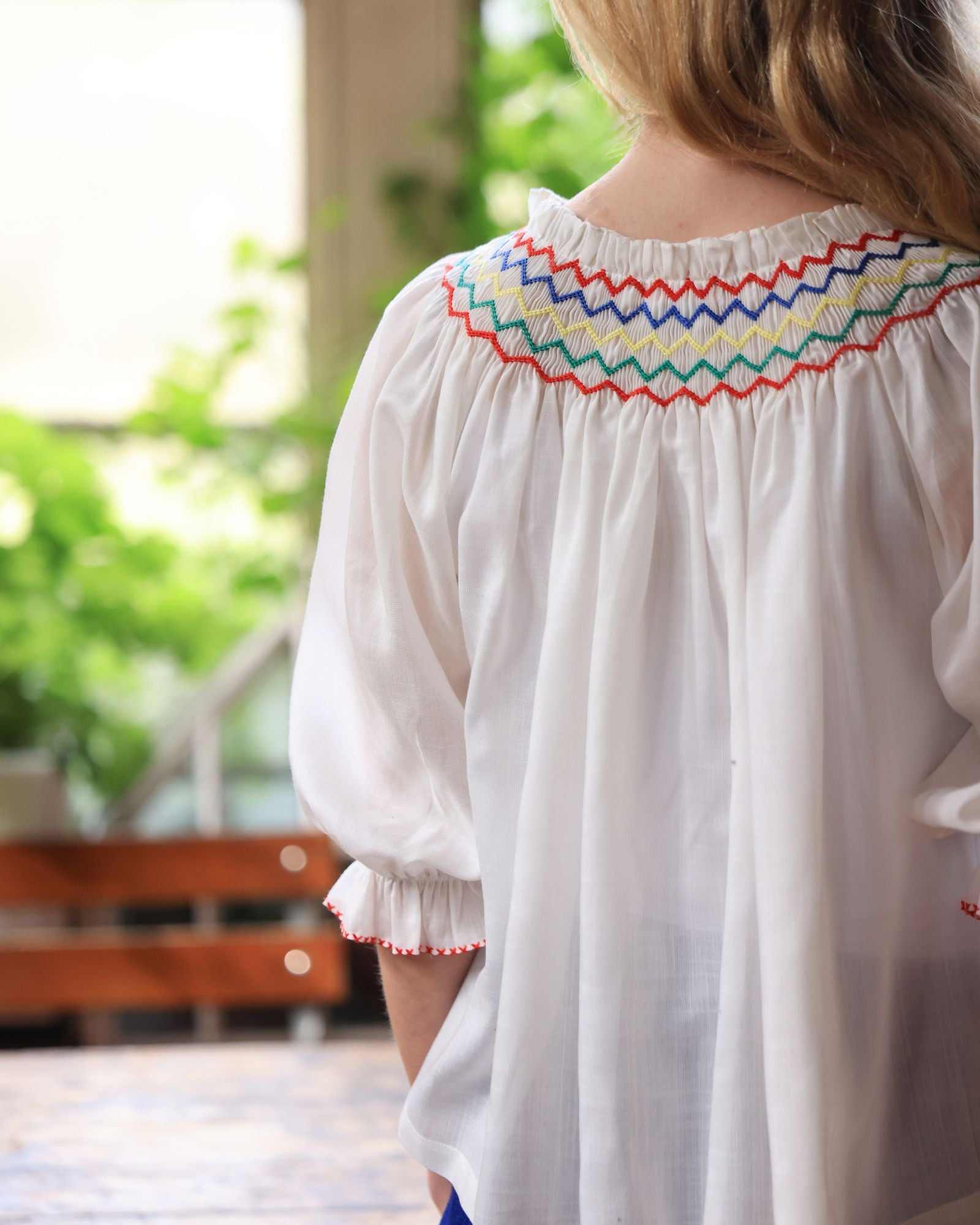 Cleopatra Blouse White Weave with Primary Colour Hand Smocking Edition 50