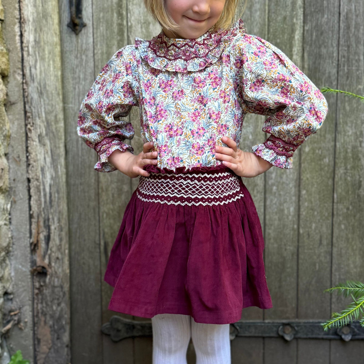 2-3 & 8-10y Annie Sullivan Skirt Mulberry Needlecord with Heather Haze Hand Smocking