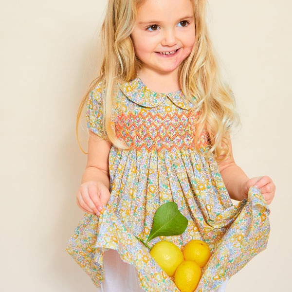 Antoinette Dress with with Tutti Fruiti Hand Smocking made with Liberty Michelle Yellow