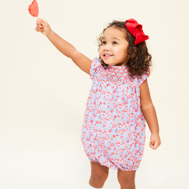 Coco Romper with Carnation Hand Smocking made with Liberty Theresa Pink