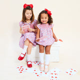 1-2y Coco Romper with Carnation Hand Smocking made with Liberty Theresa Pink