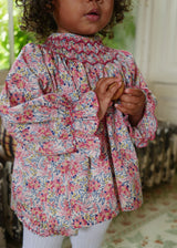Joan of Arc Blouse and Bloomers Set with Ruby Tuesday Hand Smocking made with Liberty Swirling Petals Fabric