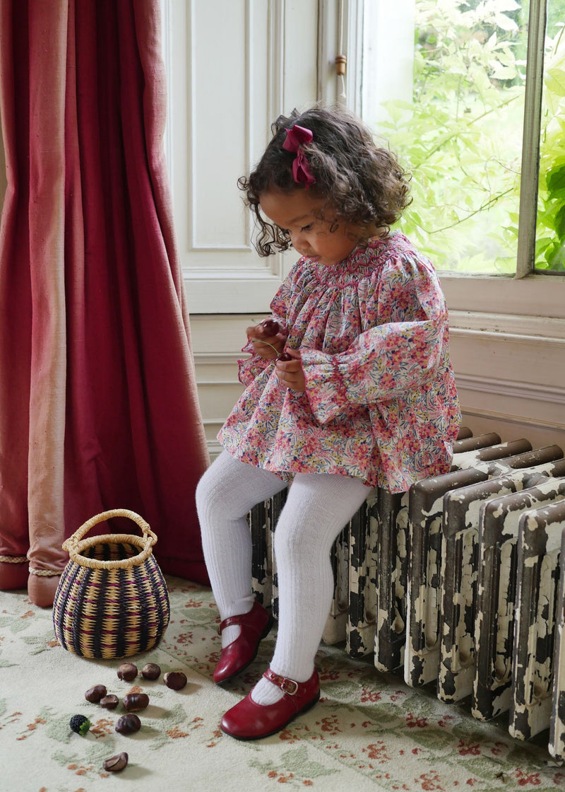 Joan of Arc Blouse and Bloomers Set with Ruby Tuesday Hand Smocking made with Liberty Swirling Petals Fabric