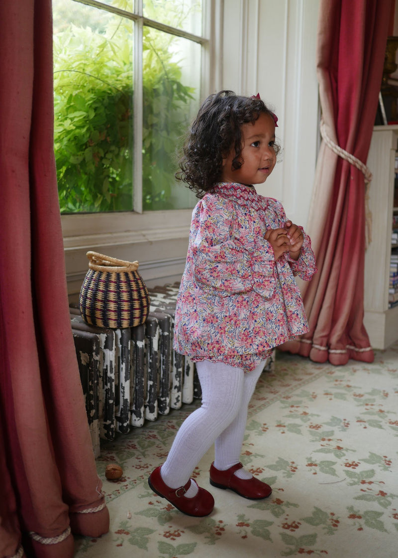 Joan of Arc Blouse and Bloomers Set with Ruby Tuesday Hand Smocking made with Liberty Swirling Petals Fabric