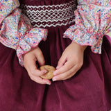 Joan of Arc Blouse with Ruby Tuesday Hand Smocking made with Liberty Swirling Petals Fabric
