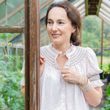 Pom x Smock London Scholl Women's Blouse Short Sleeves Sweetpea Pink Ditsy with Cottage Garden Hand Smocking