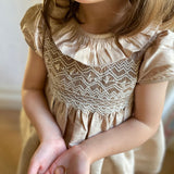 Diana Special Occasion Dress Champagne Silk with Gypsophila Hand Smocking